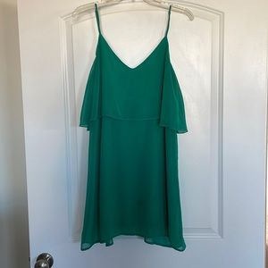 Green mini dress with low back and adjustable straps, size medium